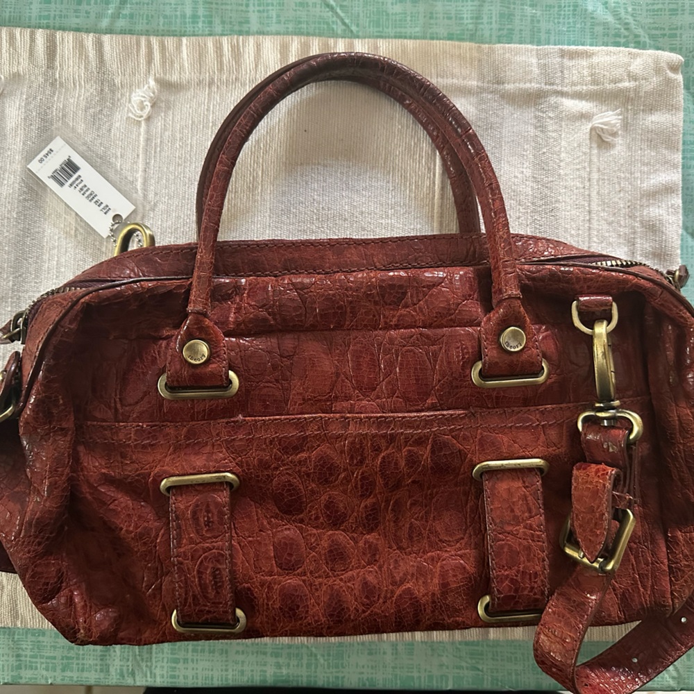 Ruby red alligator Theory purse. Never used. Originally $545 asking $250.